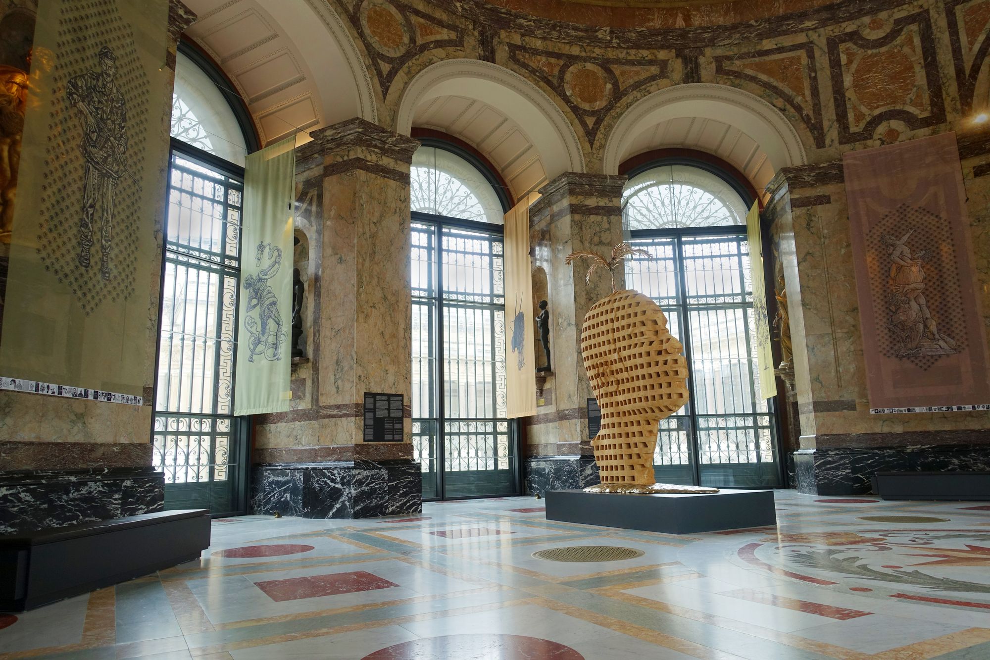 The artworks of Aimé Mpane and Jean-Pierre Müller in the museum's main rotunda. © Tim Debroyer